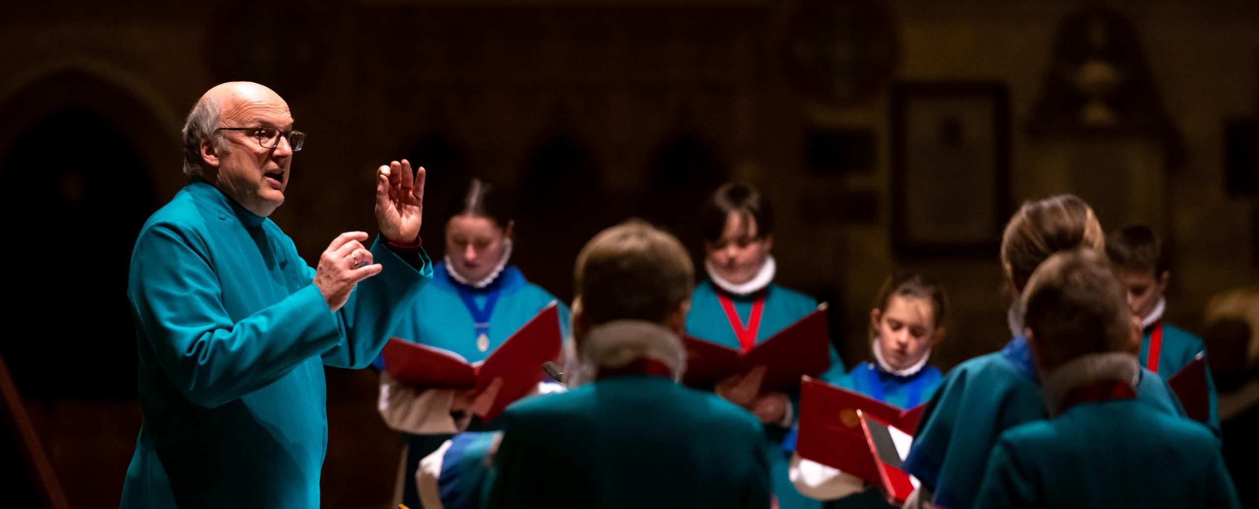 Director of Music rehearsing with the Choir