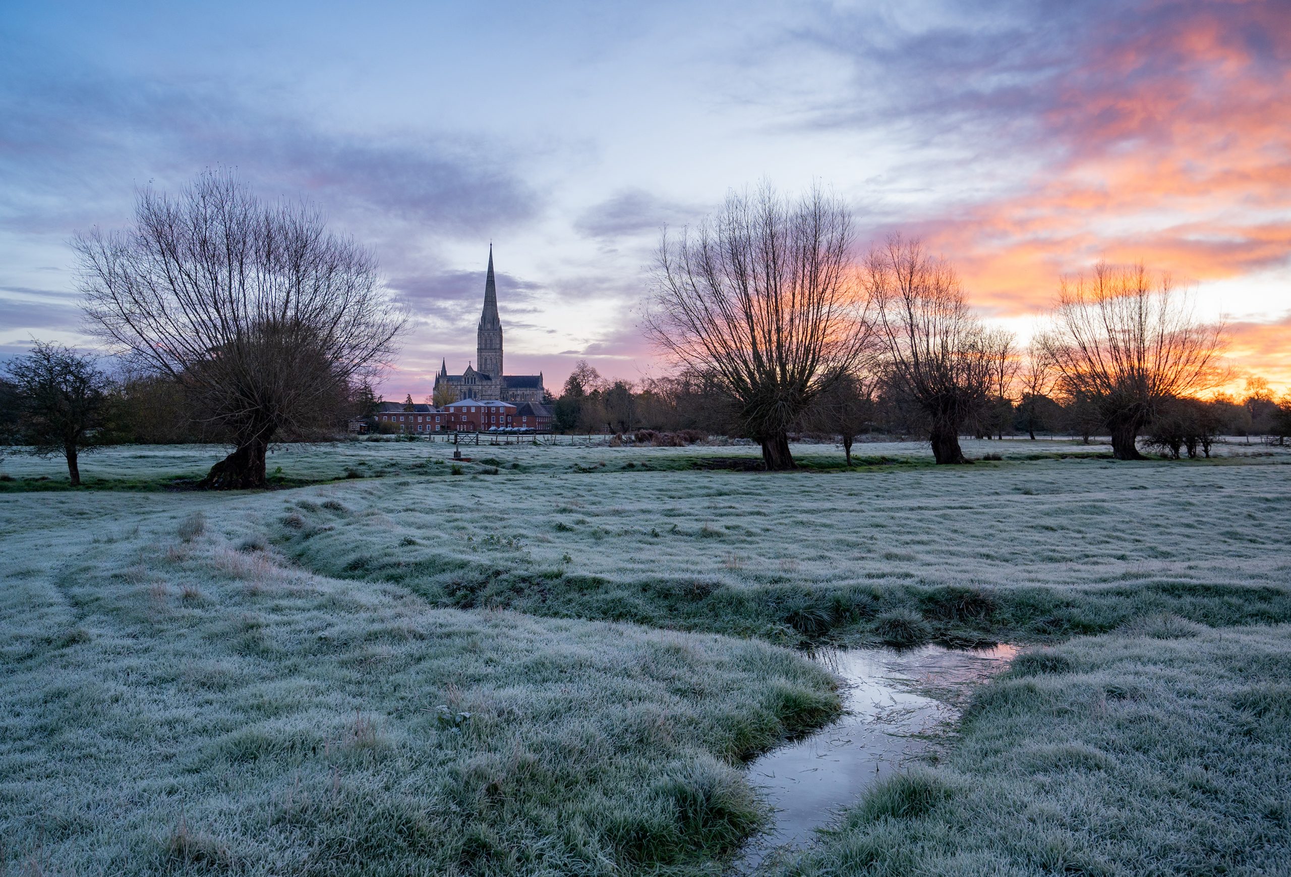 View across the watermeadows at sunrise